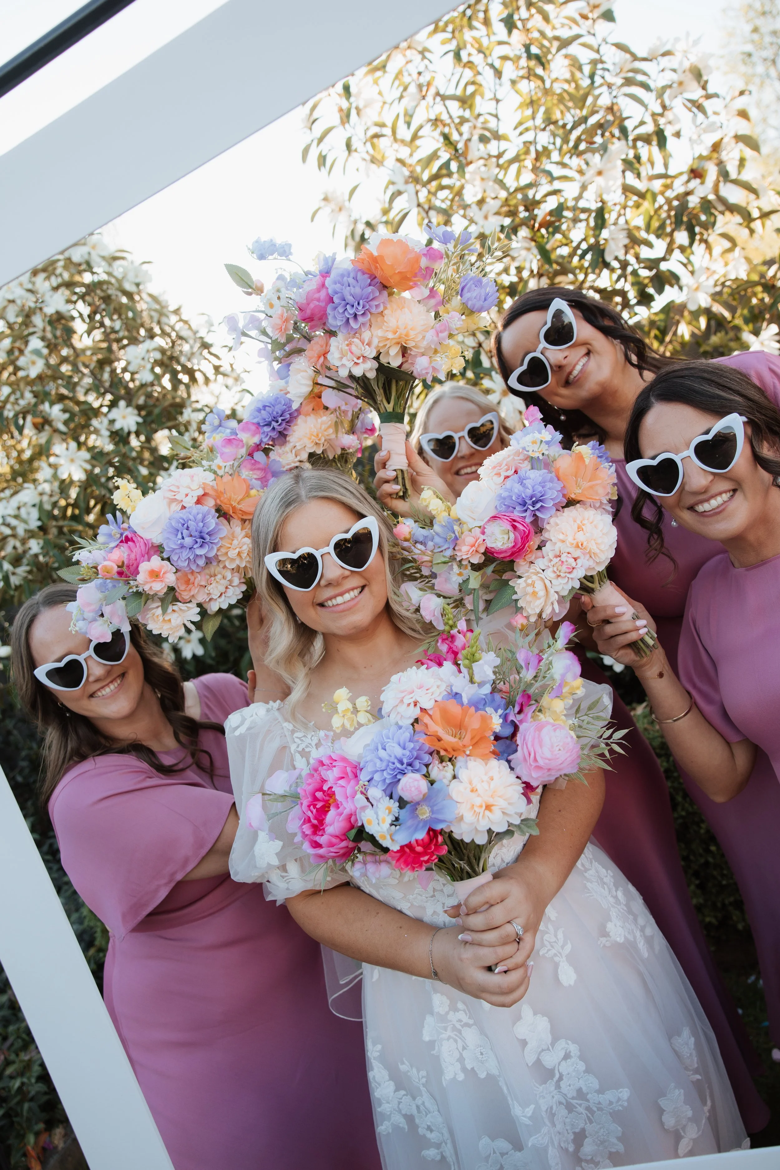 bride surrounded by her bridal tribe