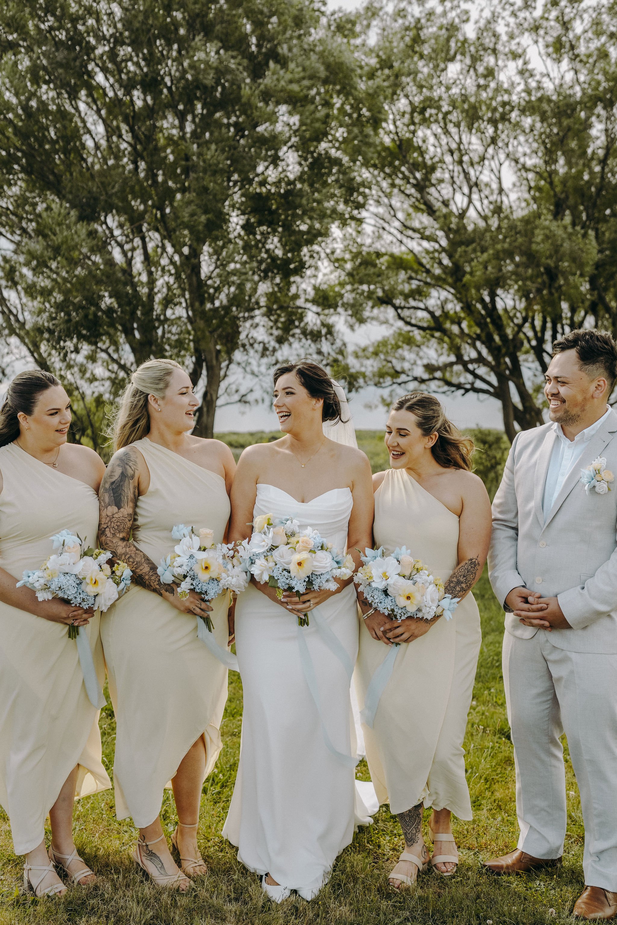 bride tribe gathered for traditional portraits