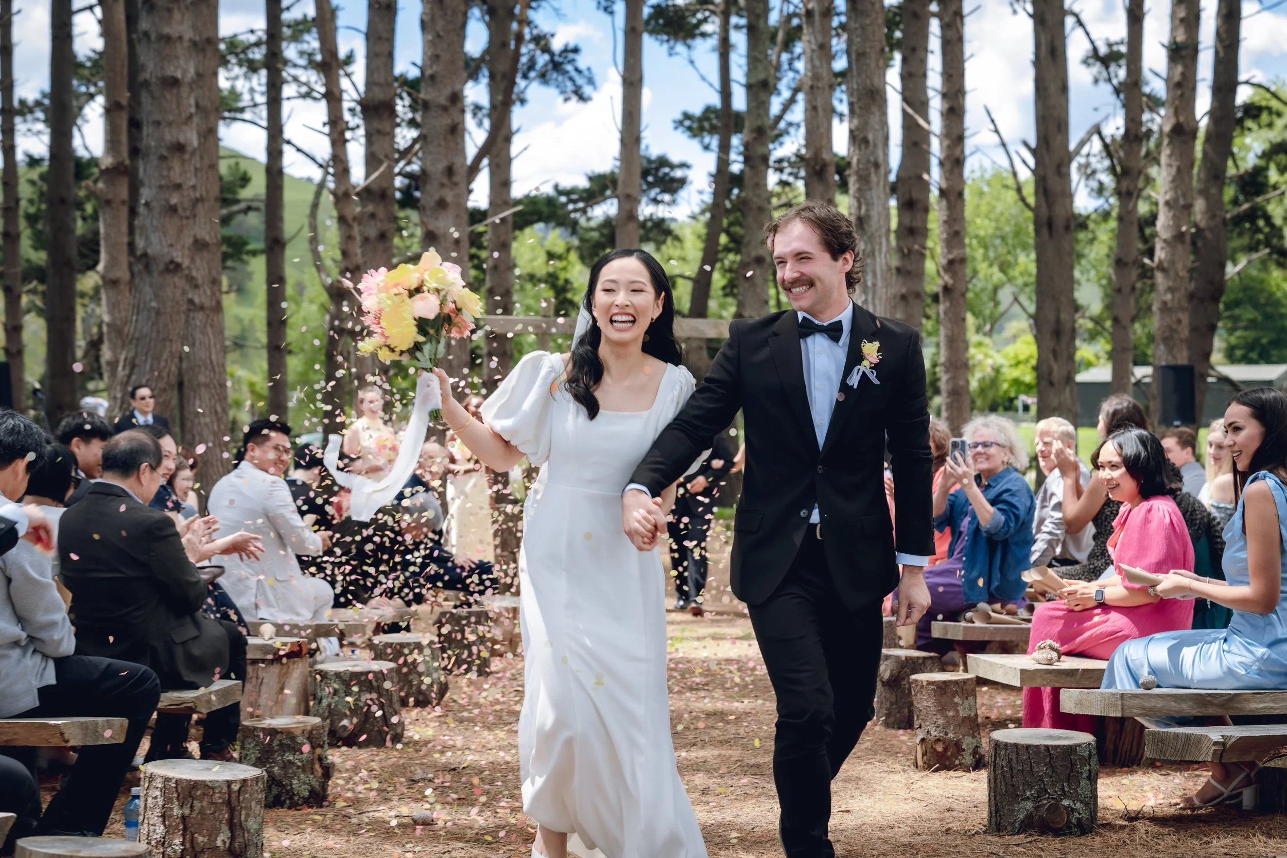 newlyweds exiting the ceremony 