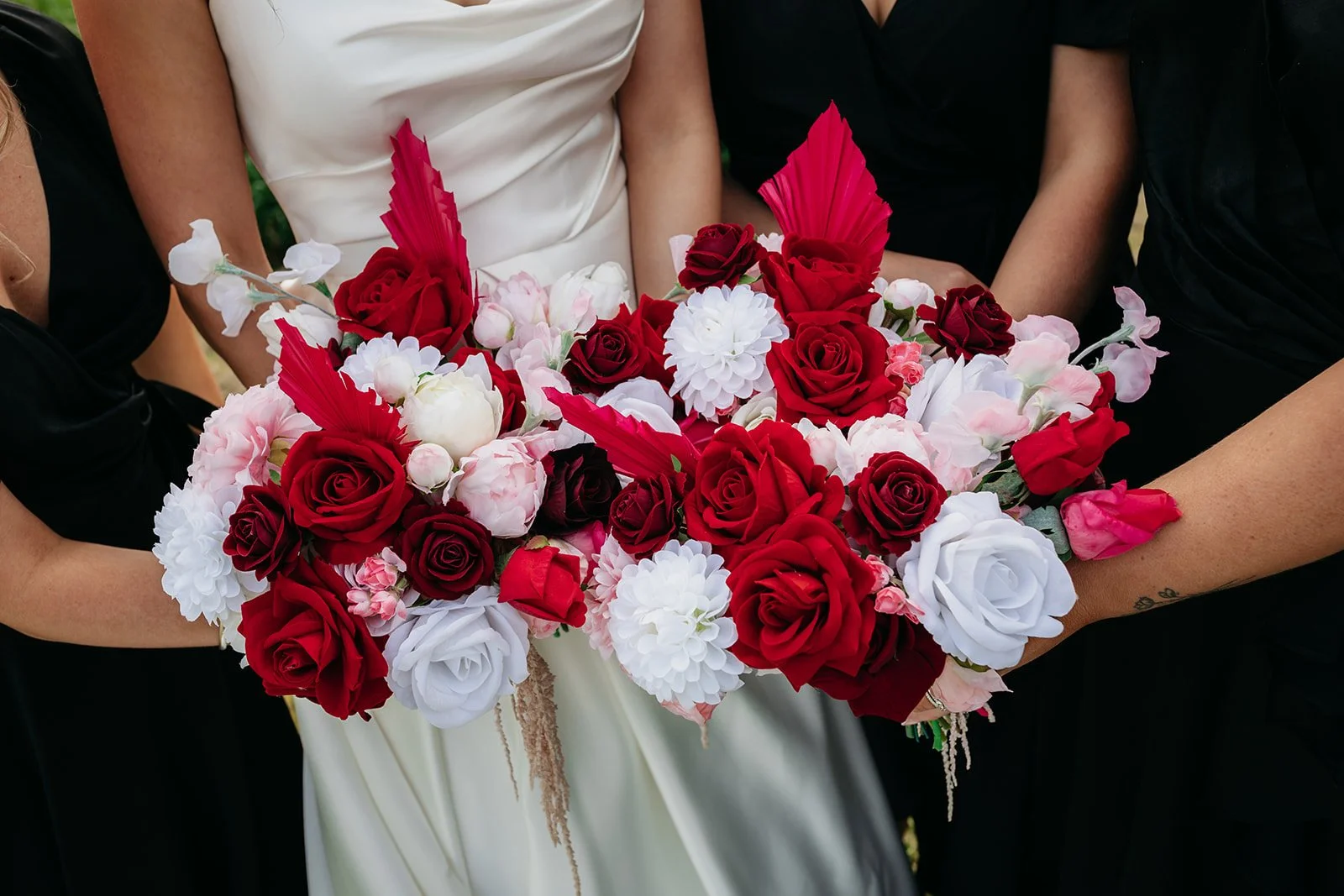 bright red flowers for bridal and bridesmaids bouquets