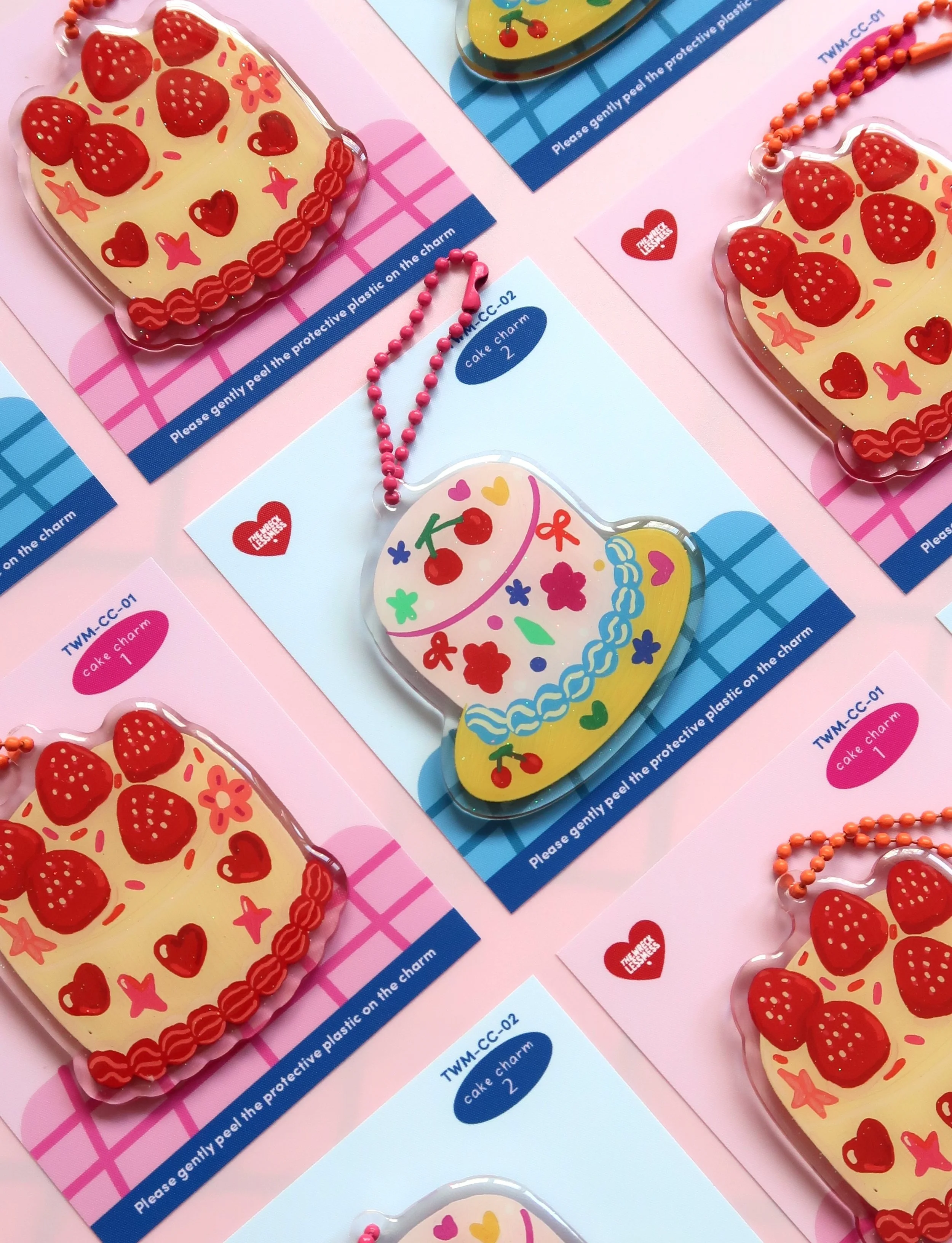 Glitter and rounded acrylic cute cake charm. Approx. 6cm. Suitable for bags, and keychains. Illustrated by Nina Zai in Singapore. The Wrecklessmess.