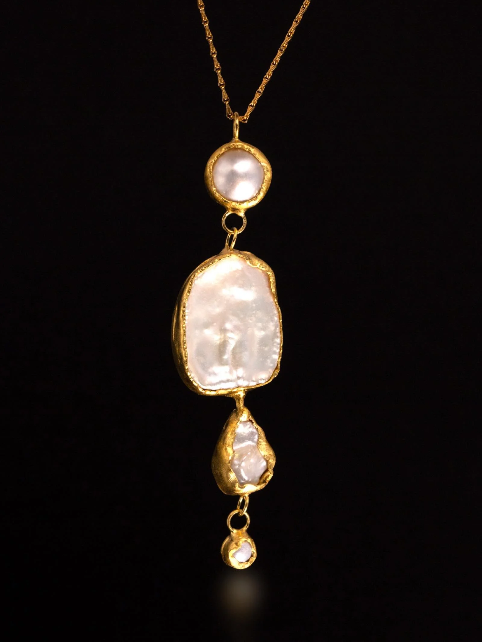 A new one-of-a-kind pearl pendant has just been added to the website &mdash; freshwater pearls suspended in rich forged layered gold, composed as a contemporary heirloom.

Handmade in my London studio.

Available now via the link in bio.

#susanmacle