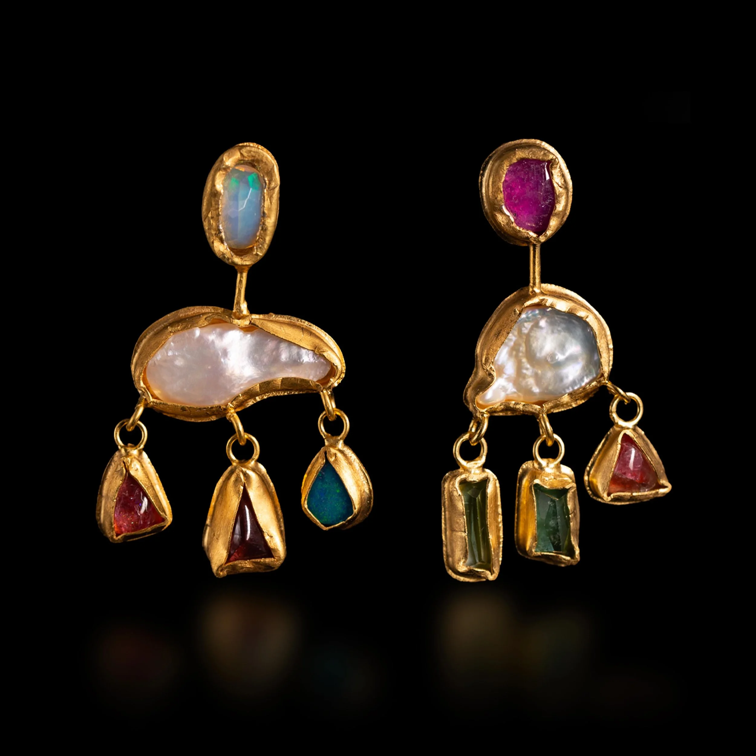 Ethiopian Opal, Tourmalines, Baroque Chandelier Earrings 

Like treasures unearthed and reimagined, these earrings combine layered molten gold, rare gemstones and organic form. Bold yet refined, they celebrate individuality through layers of colour, 