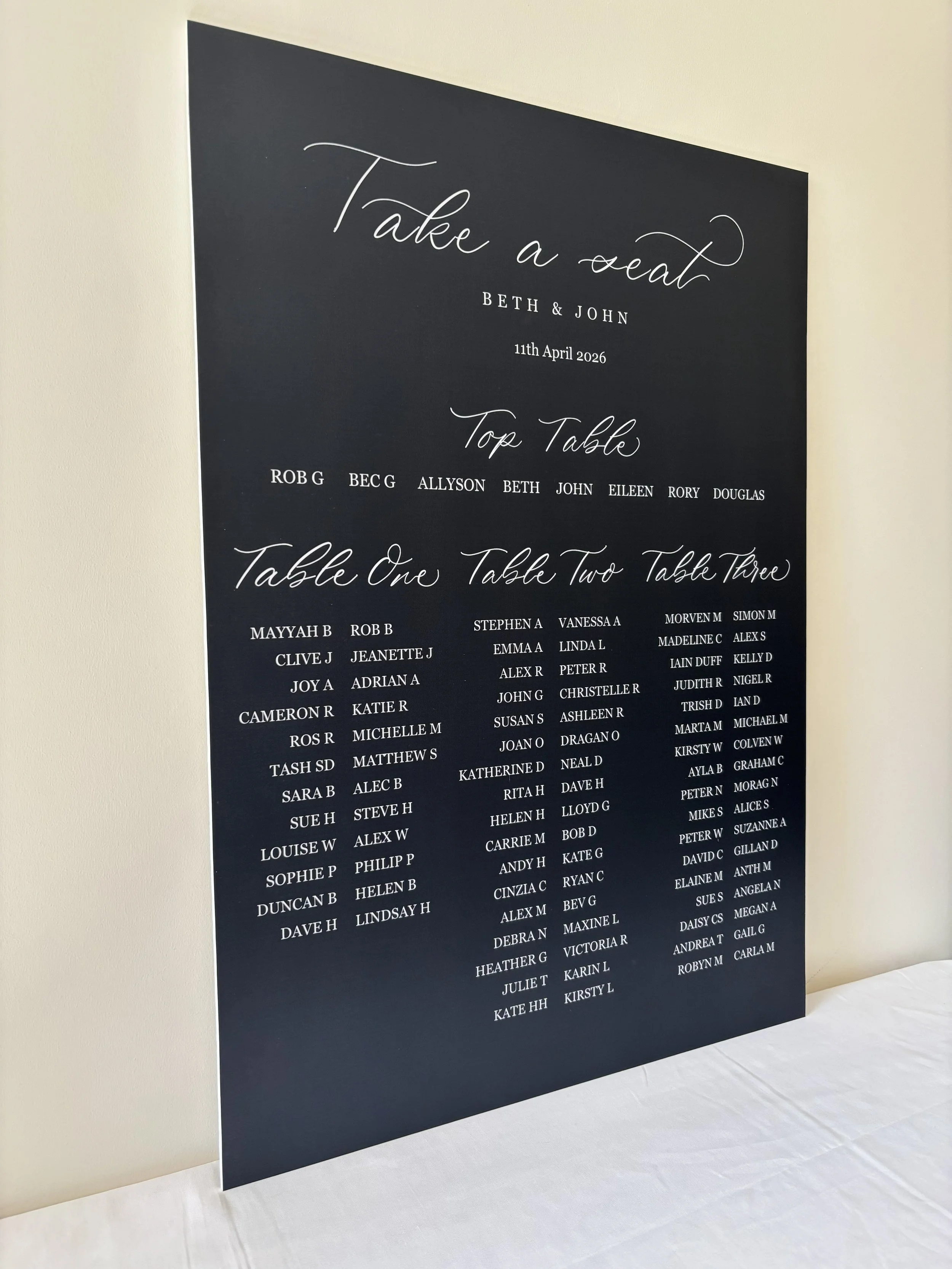 A1 foamex wedding board seating plan. Simple white modern calligraphy paired with a block font. Perfect for rustic or minimalist wedding.