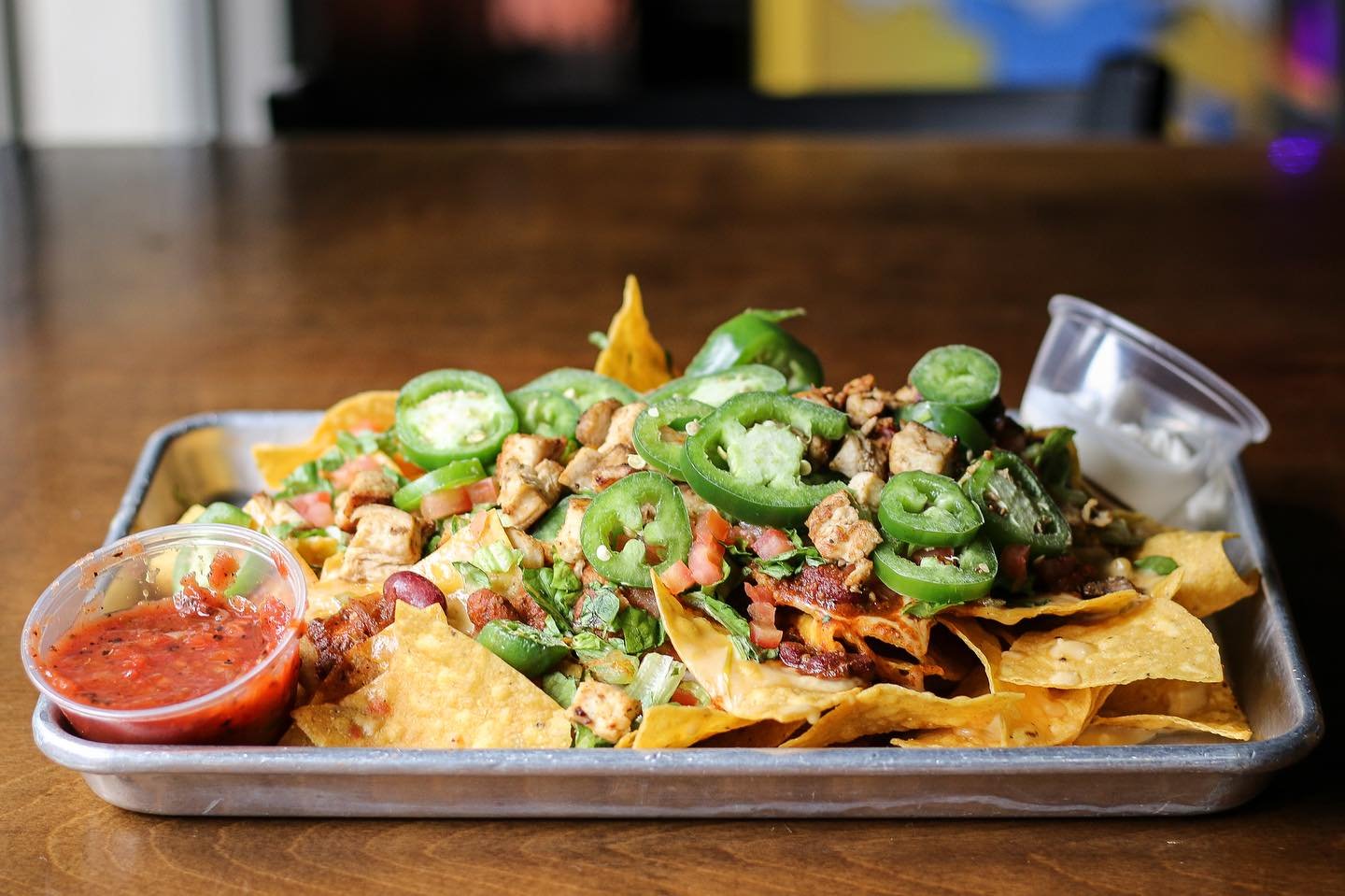 Happy Hour 3-7pm with $7 Nachos &amp; $5 Well Drinks!