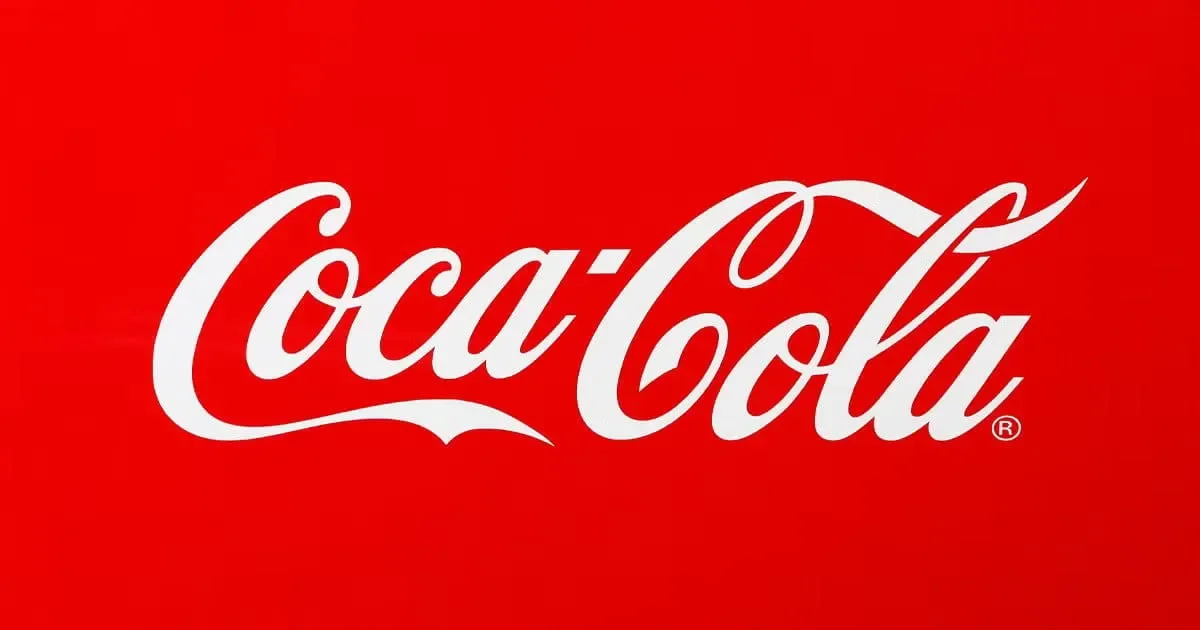 The Coca-Cola logo with white cursive text on a red background.