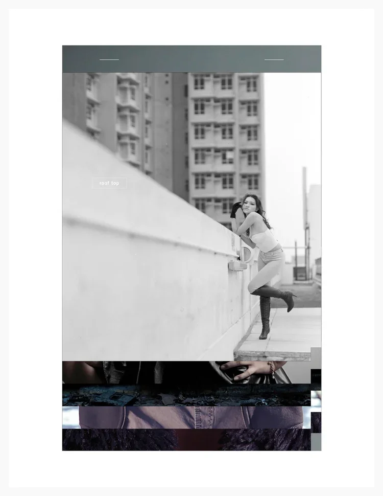 A woman leaning on a rooftop ledge with tall buildings in the background.