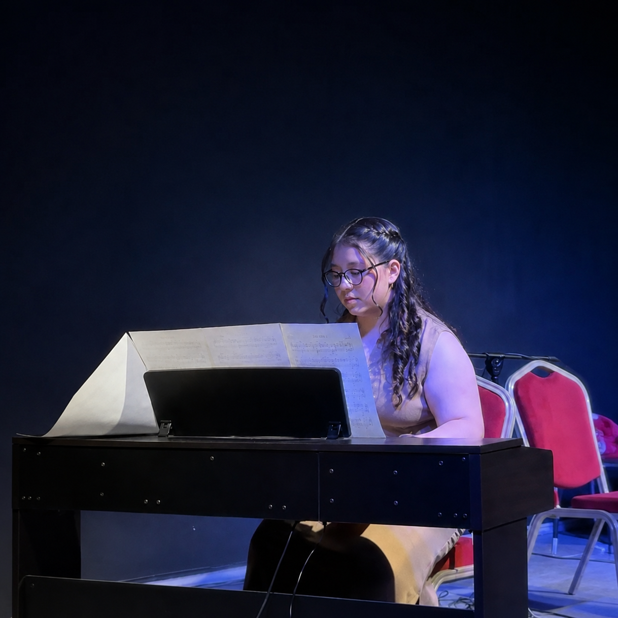 woman playing the piano