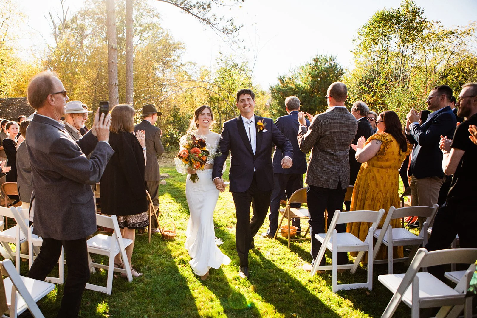 Intimate backyard wedding ceremony in Foster Rhode Island with natural greenery