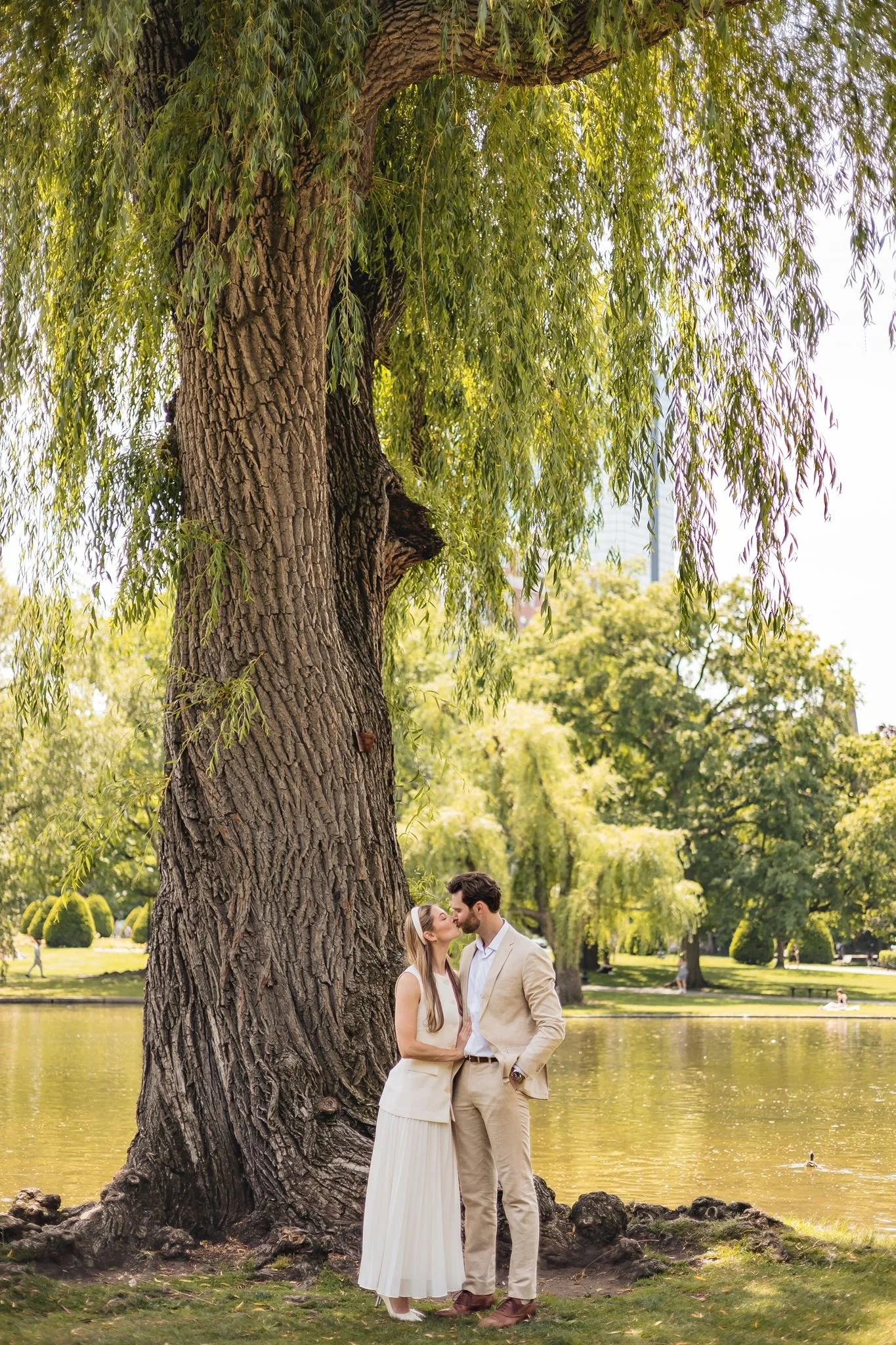 Newlyweds walking through downtown Boston following an intimate courthouse wedding.