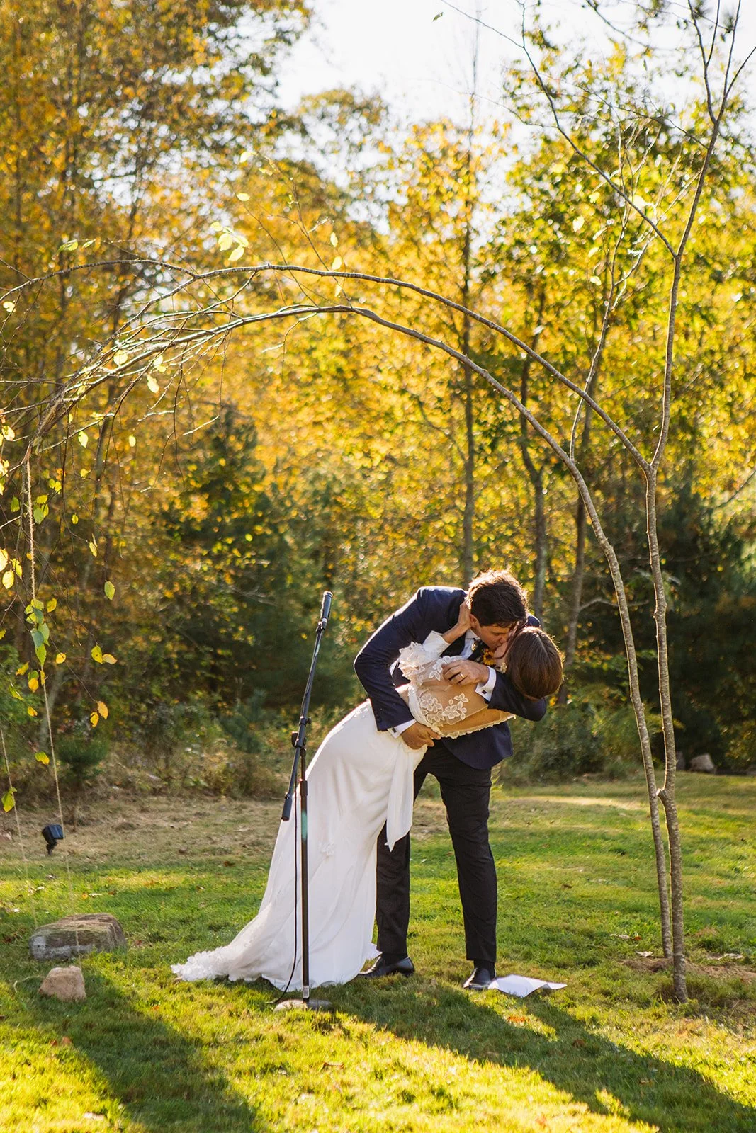 Backyard wedding ceremony in Foster Rhode Island with natural greenery