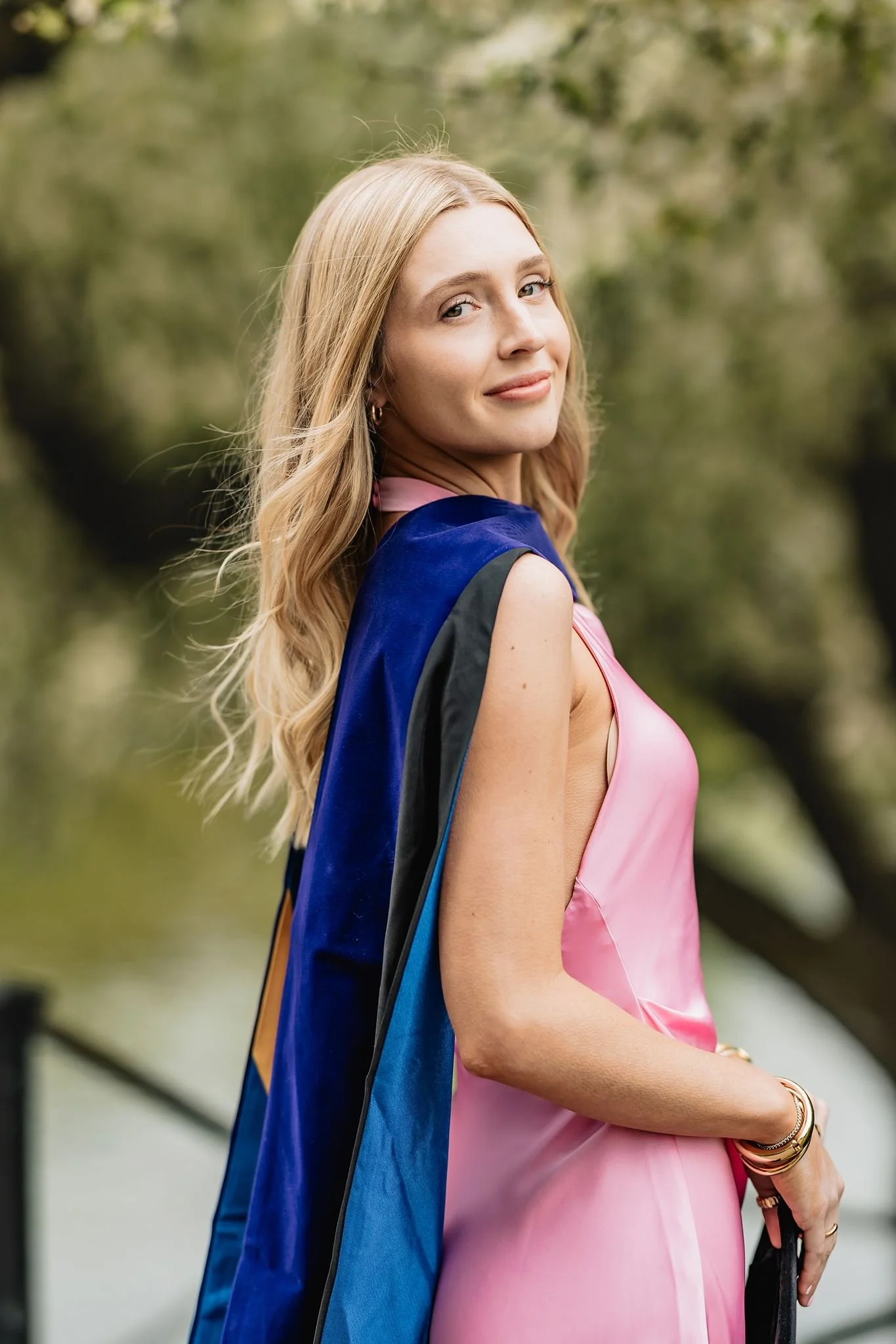 Graduation portraits by the waterfront in Boston during spring