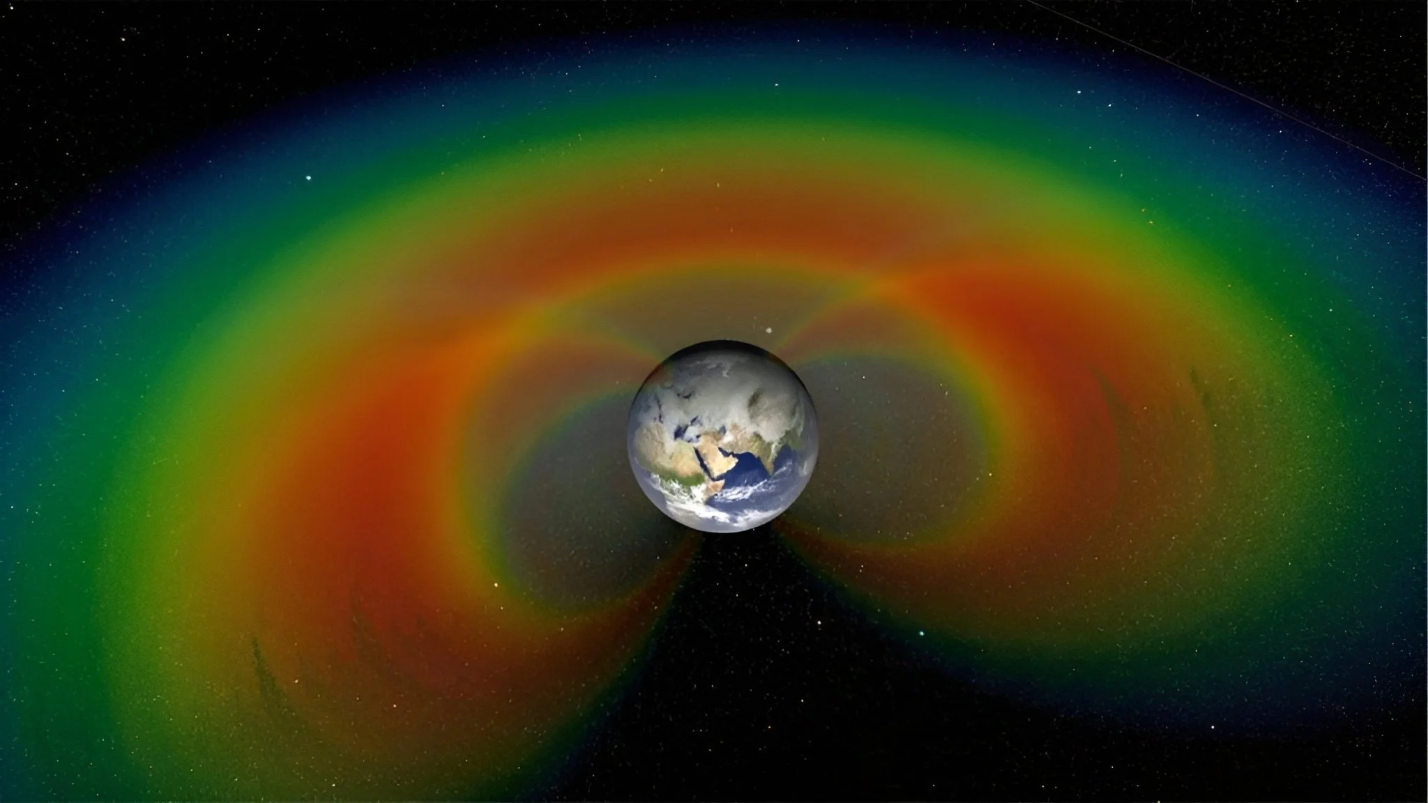 Image of Earth with colorful auroras or electromagnetic field lines surrounding it, set against a starry space background.