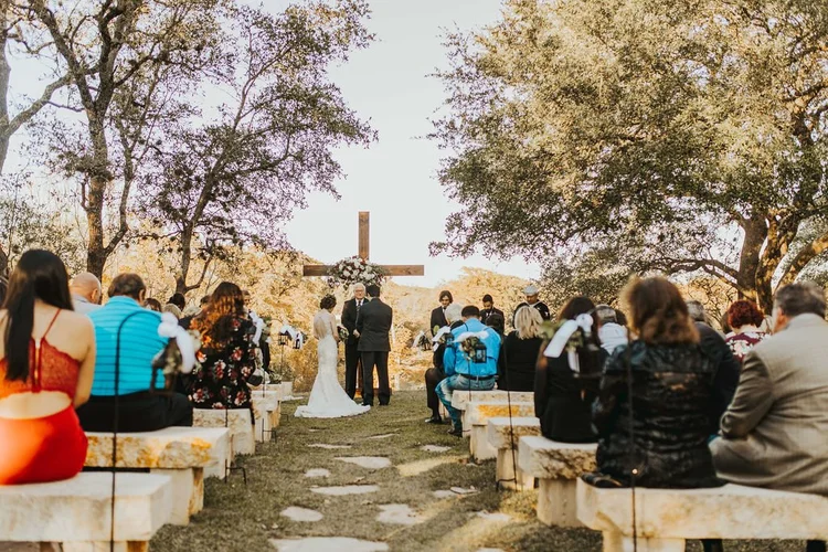 Outdoor ceremony under the oak trees at The Marquardt Ranch