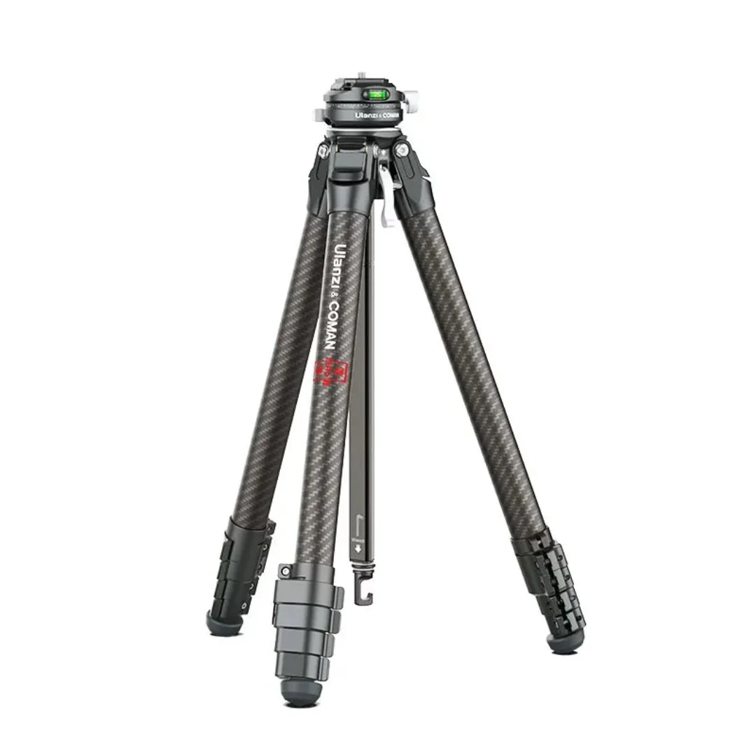 A camera tripod with carbon fiber legs and a black mounting head.