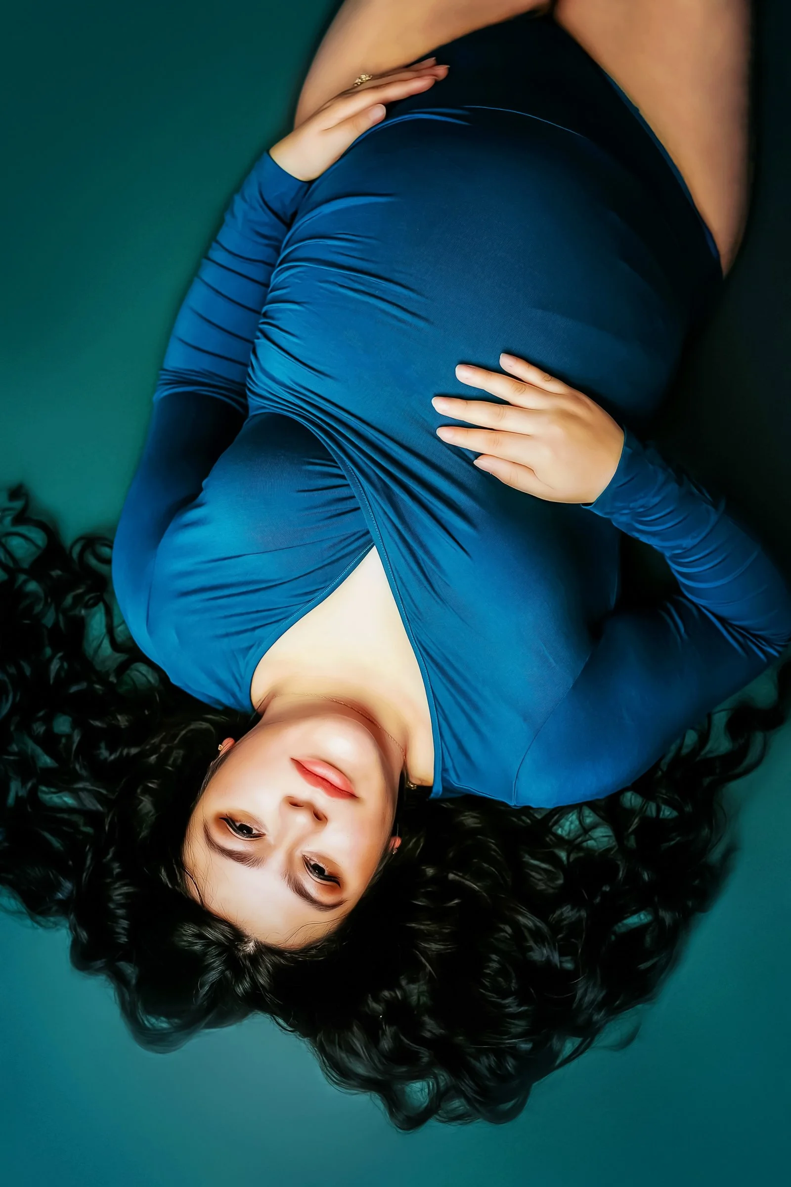 A beautiful Mommy to be poses in a gorgeous bodysuit during her Winchester VA Maternity Photography session with Worthy of Love Photography session a Winchester VA Family Photographer