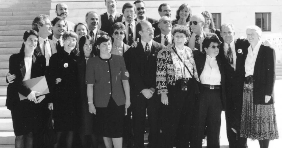 The plaintiffs of the landmark case Romer v. Evans standing with their legal team outside of the Supreme Court | Credit: Lambda Legal
