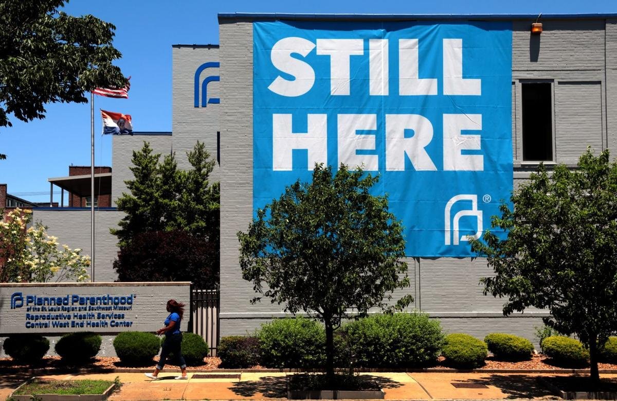 A banner hanging on the side of the Planned Parenthood of St. Louis after a state judge ruled against an attempt by Gov. Parson's administration to shut down the lone abortion clinic in Missouri | Credit: Robert Cohen, St. Louis Post-Dispatch