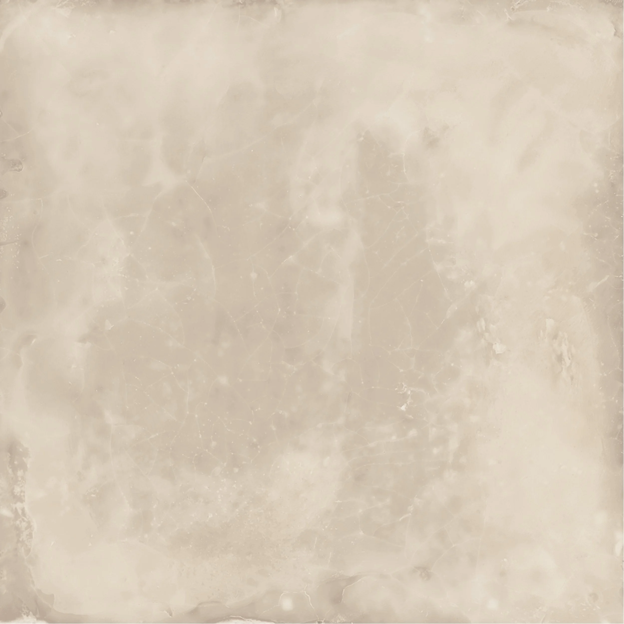 Close-up of a textured, beige marble surface with natural veins and cracks.