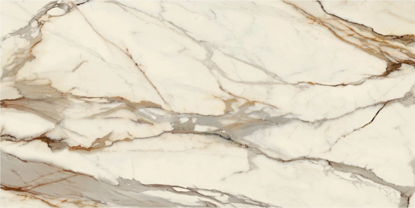 Close-up photo of a marble surface with white and beige tones and natural brown veining.