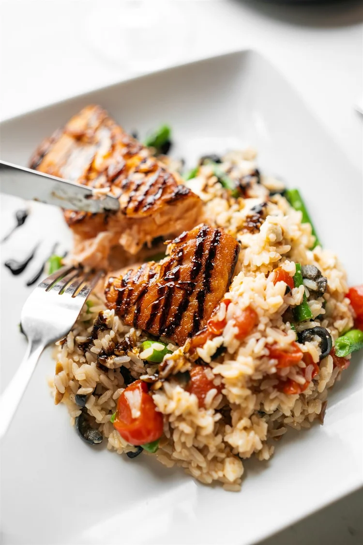 Grilled chicken over Mediterranean rice