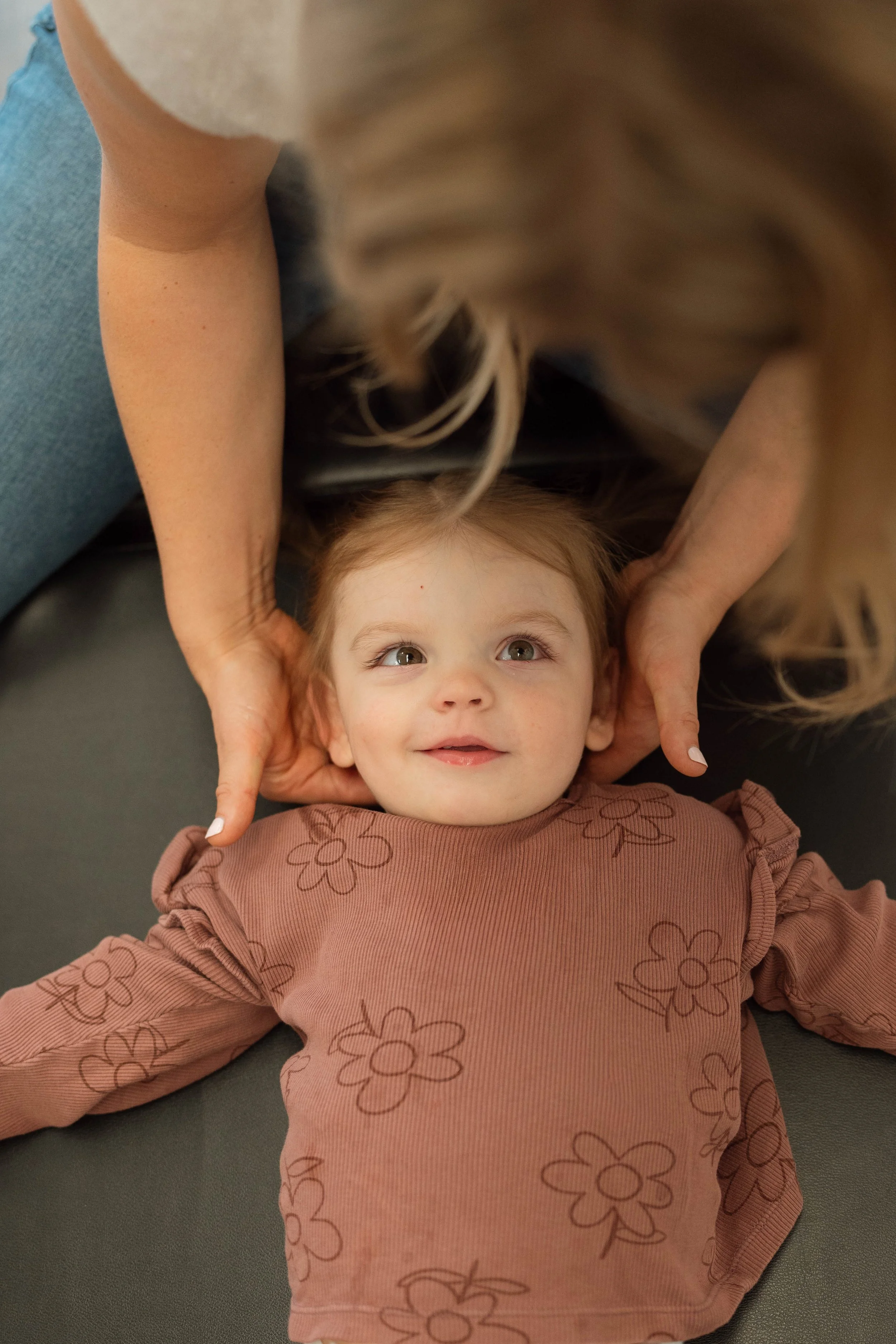 A pediatric patient being adjusted. 