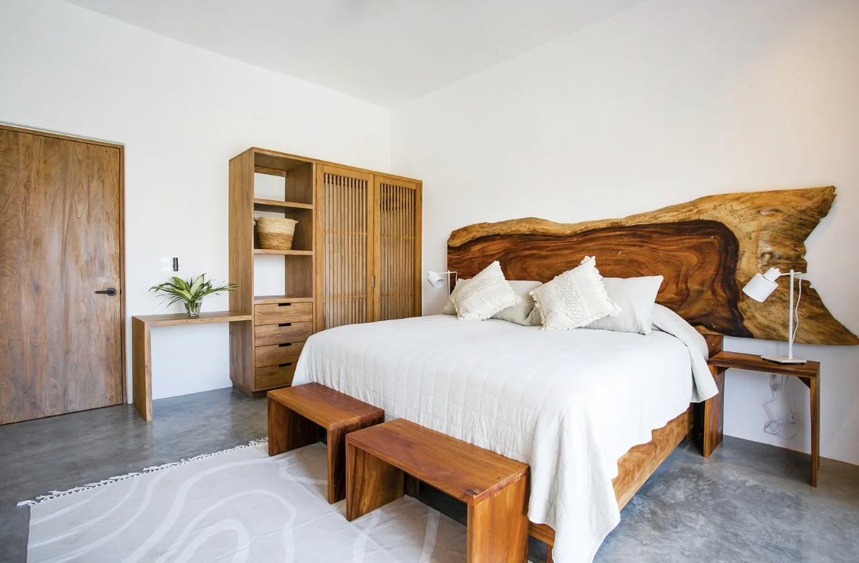 Modern bedroom with local Mexican wood and king bed.