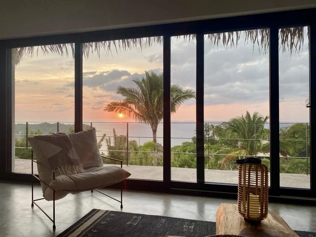 indoor lounge looking out over the ocean