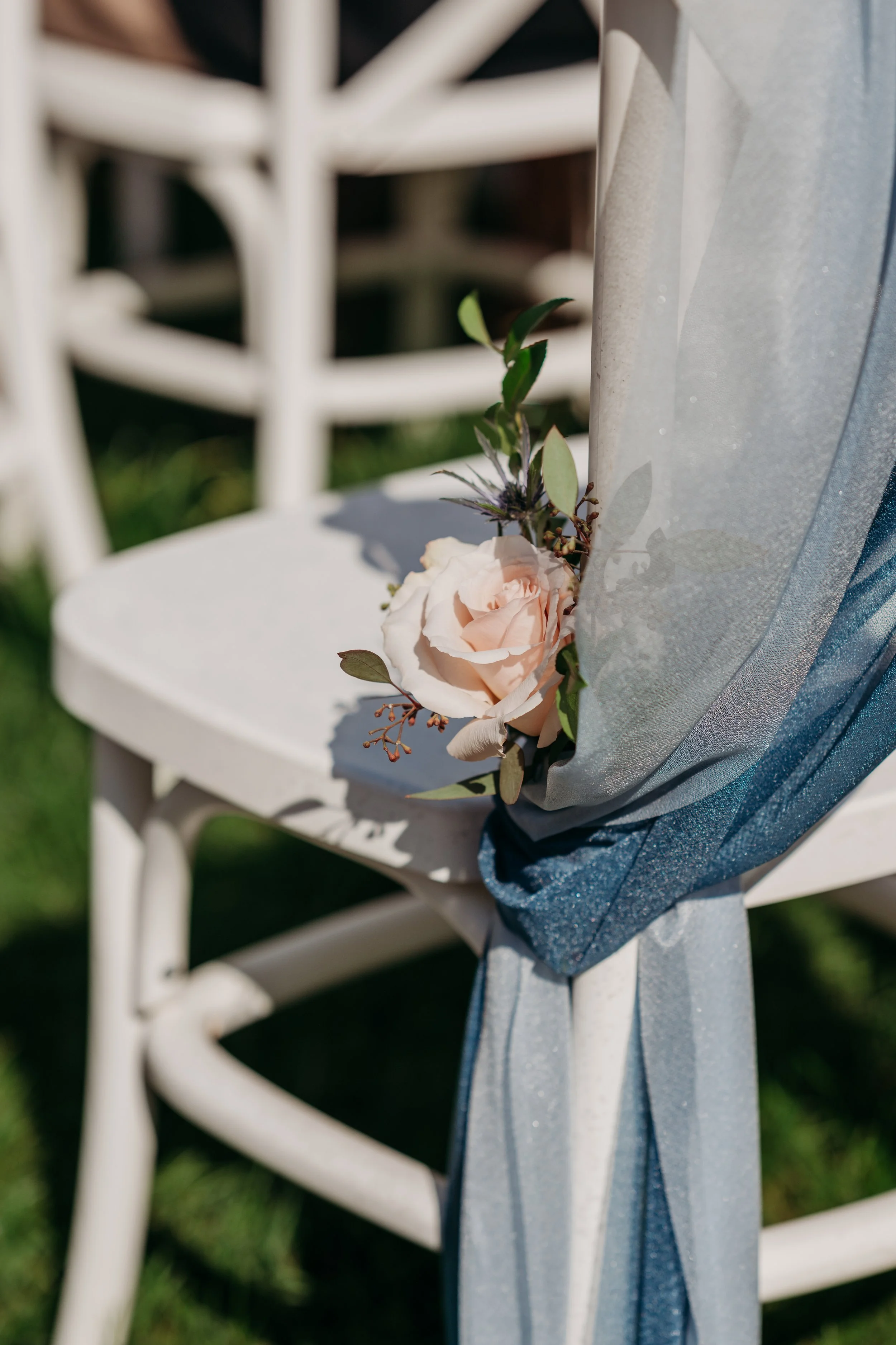 Chattanooga wedding florist blue white blush delphinium dahlia black bride summer florals garden style aisle marker chairs chair florals chair scarves