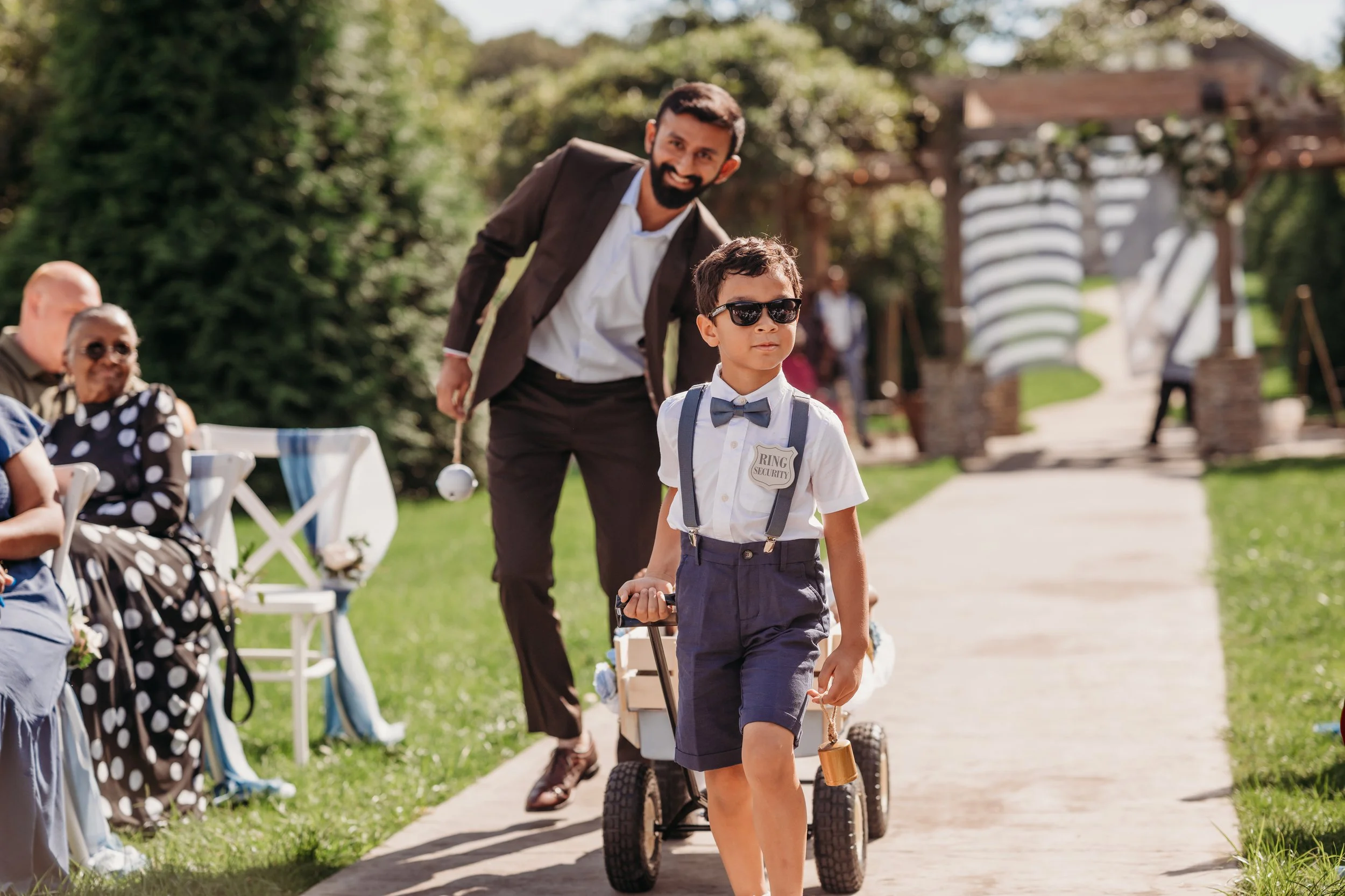 Chattanooga wedding florist blue white blush delphinium dahlia black bride summer florals garden style gazebo howe farms apple barn ringbearer chair florals aisle markers