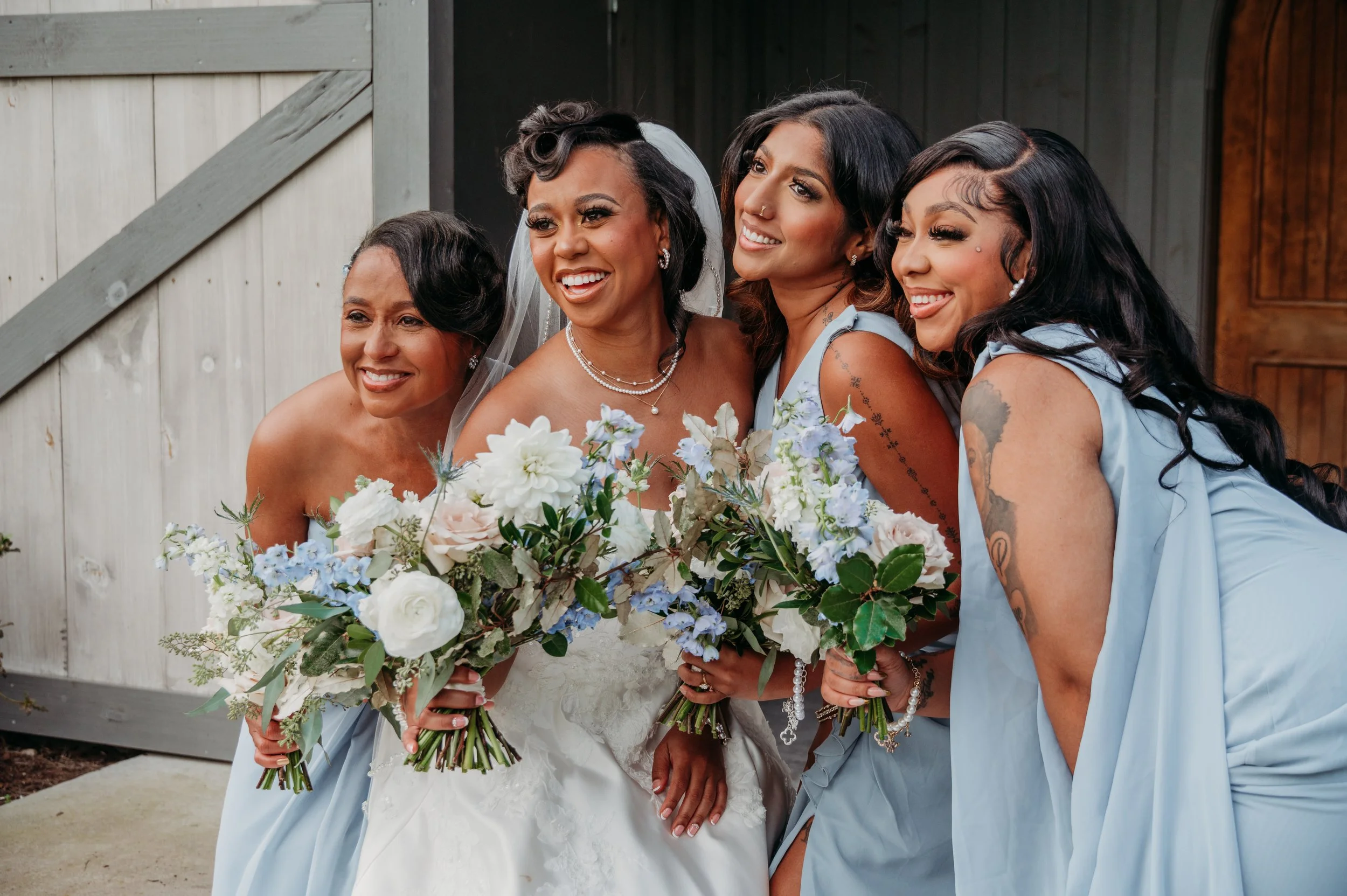 Chattanooga wedding florist blue white blush delphinium dahlia black bride summer florals garden style bridesmaid bouquets