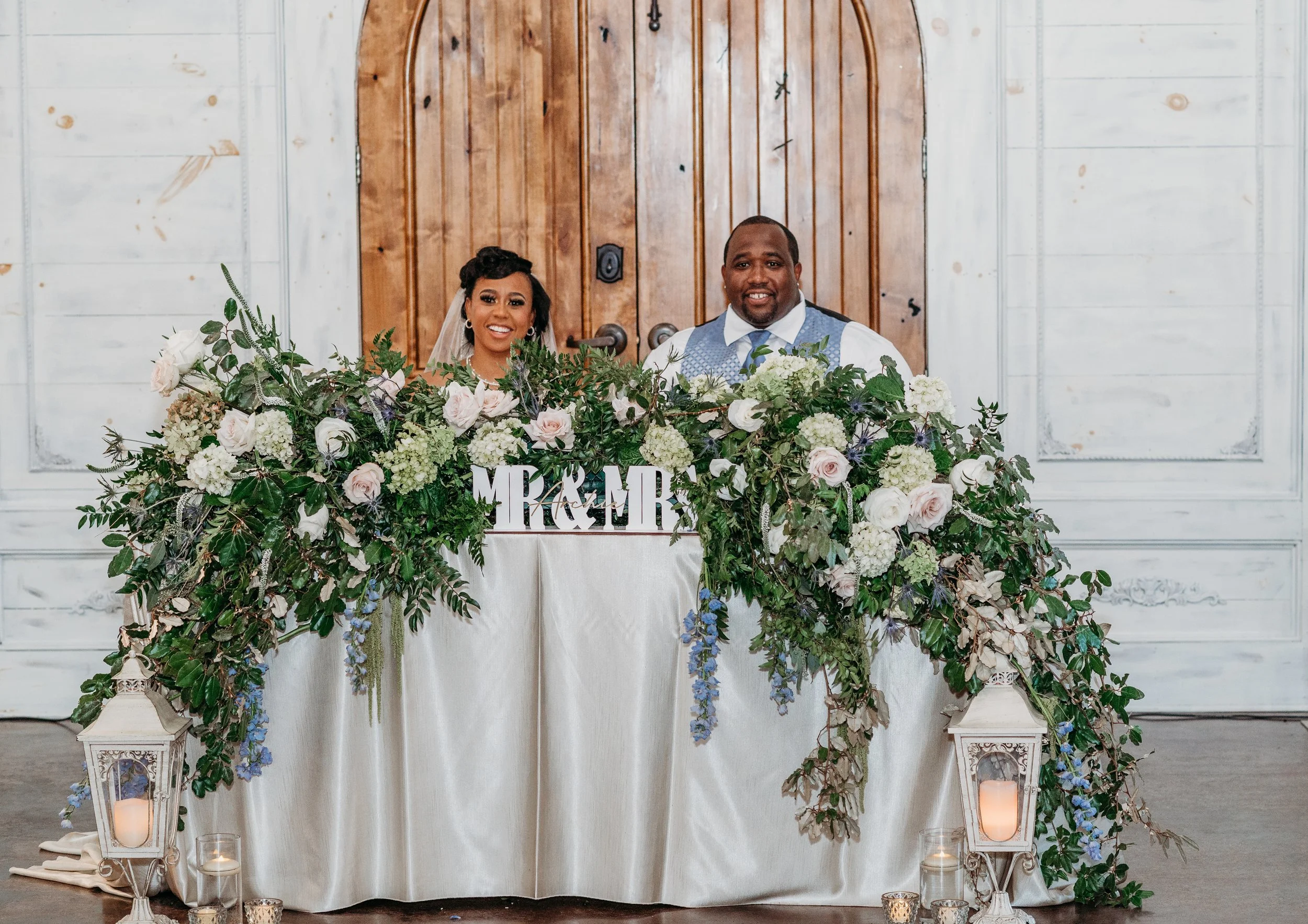 Chattanooga wedding florist blue white blush delphinium dahlia black bride summer florals garden style howe farms apple barn sweetheart table repurpose florals
