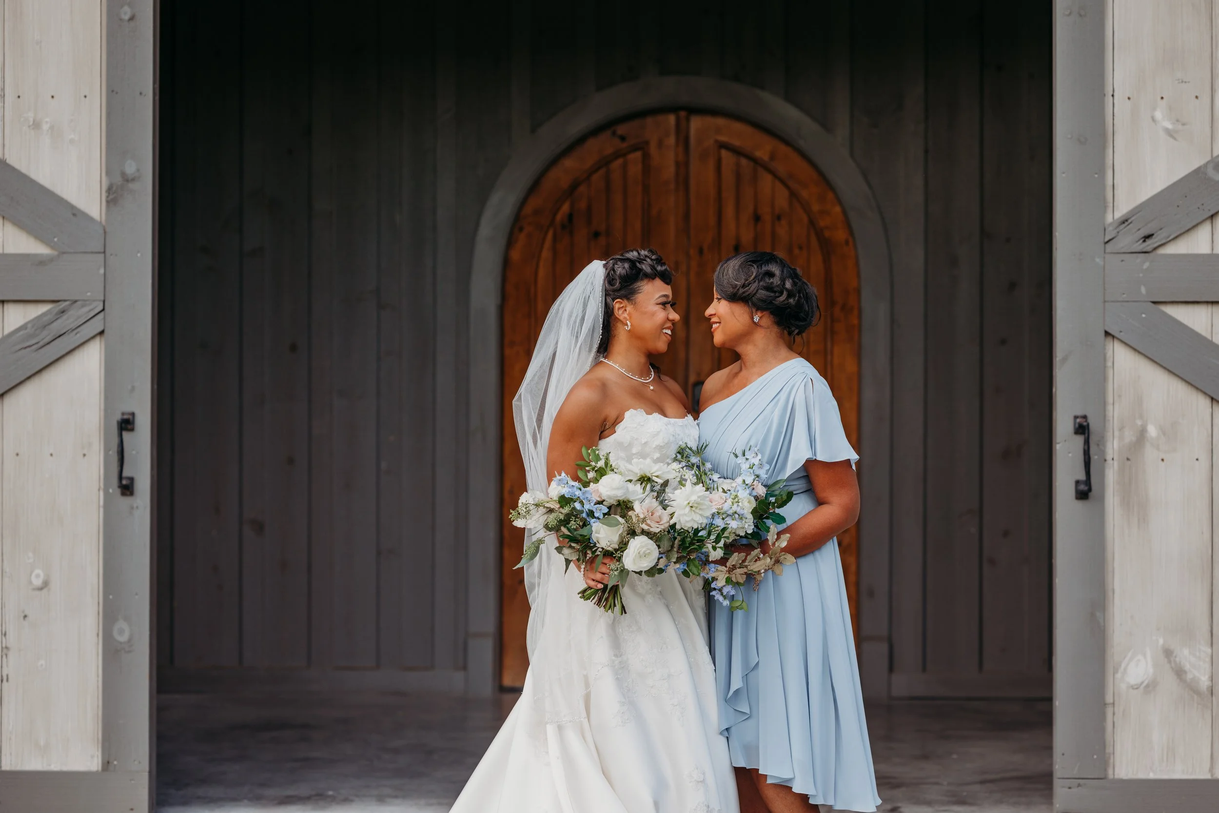 Chattanooga wedding florist blue white blush delphinium dahlia black bride summer florals garden style bridesmaid bouquets