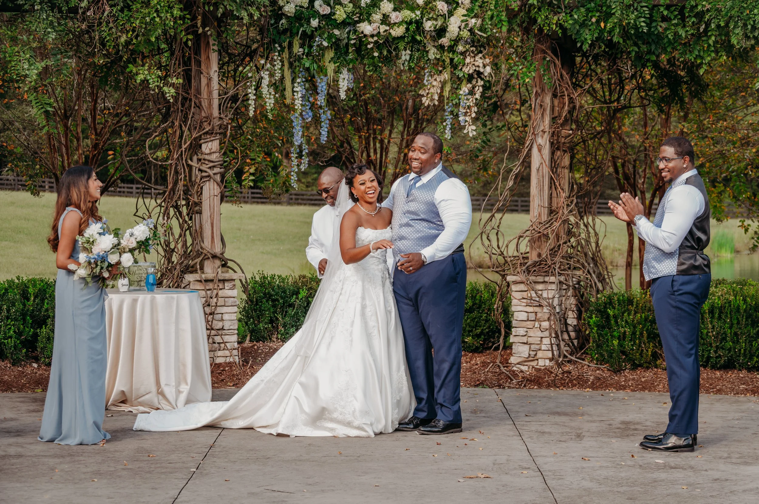 Chattanooga wedding florist blue white blush delphinium dahlia black bride summer florals garden style floral chandelier hanging florals arbor howe farms apple barn