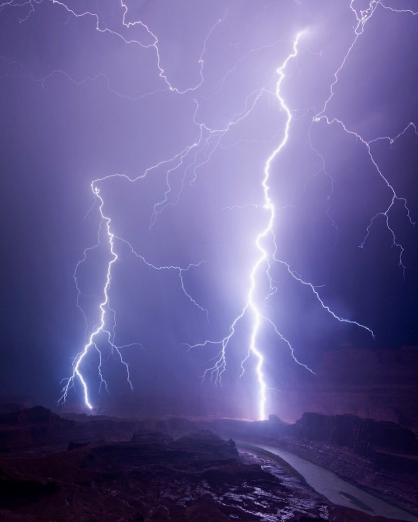 Lightning illuminates the Colorado River below us as it strikes the canyon walls at Dead Horse Point State Park in Utah. Perhaps the best lightning show (and forecast) of my career, with bolts landing all around us and in the canyon. 

This was also 