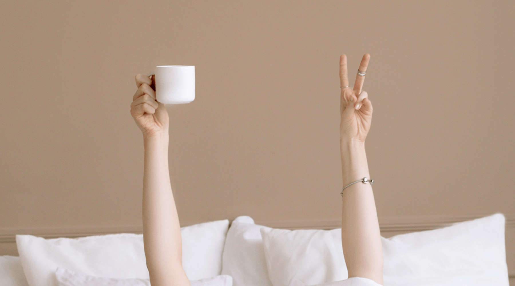 image of a woman giving a peace sign, representing how daily affirmations can embrace your sense of self worth