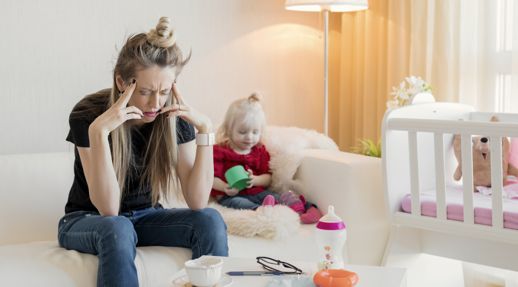 Mother experiencing crushing mom guilt and self-criticism believing lies about inadequate parenting and impossible motherhood standards