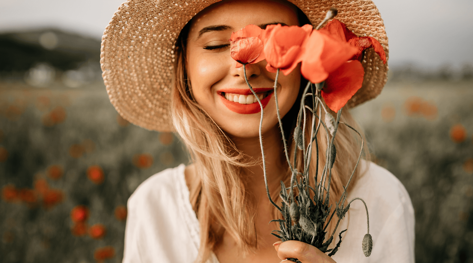 an image of a woman in a field with flowers, demonstrating the importance of SAHM's to pursue joy, hobbies and interests as well as connect with other moms