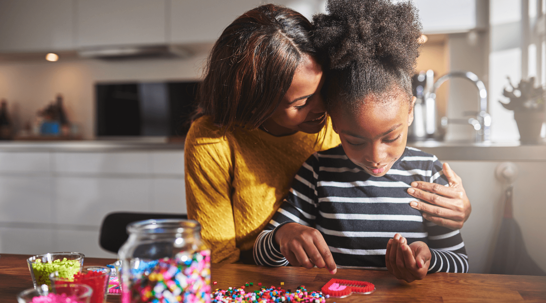 an image of a mom and daughter doing an activity together to incorporate learning into playtime