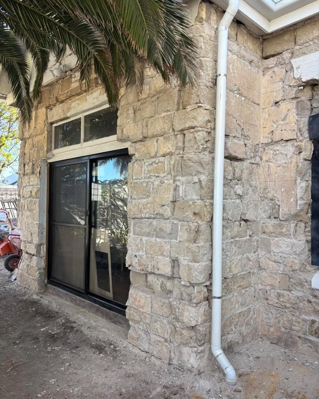 So I took the painted cement render off with great anticipation. What I found was it what I hoped for. More like,  two wheel barrows of concrete holding up some corners. The quoins departed. The window band removed itself. Big cracks through stones w