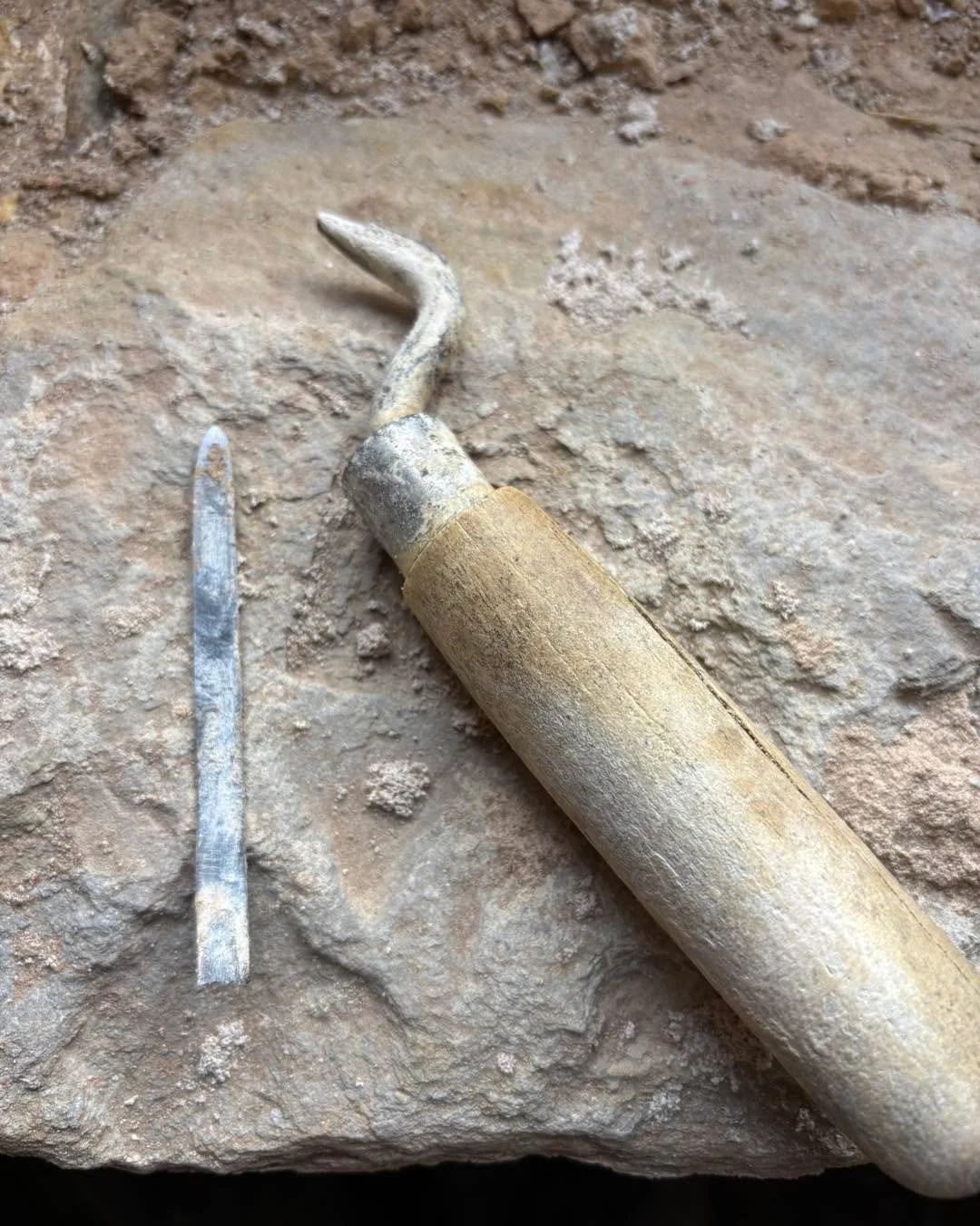 I was given an incarnation of this tool 30 years ago. It was close to 15 years old when I got it. It started life as a standard pointing trowel and has been adapted to suit various pointing requirements over the years. Today was its last go with lime