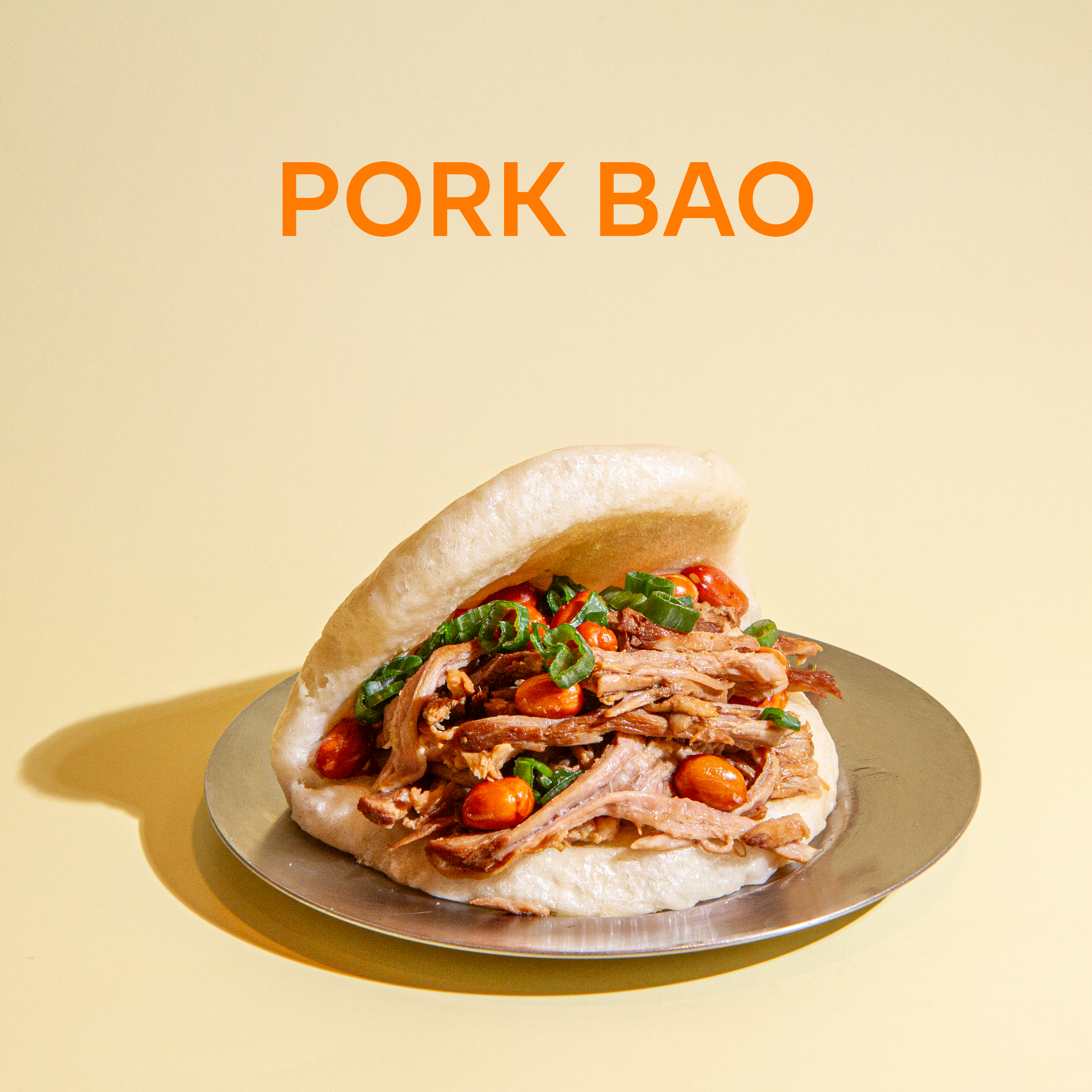Hand-rolled steamed bun, filled with braise pork, and wok fried peanuts.