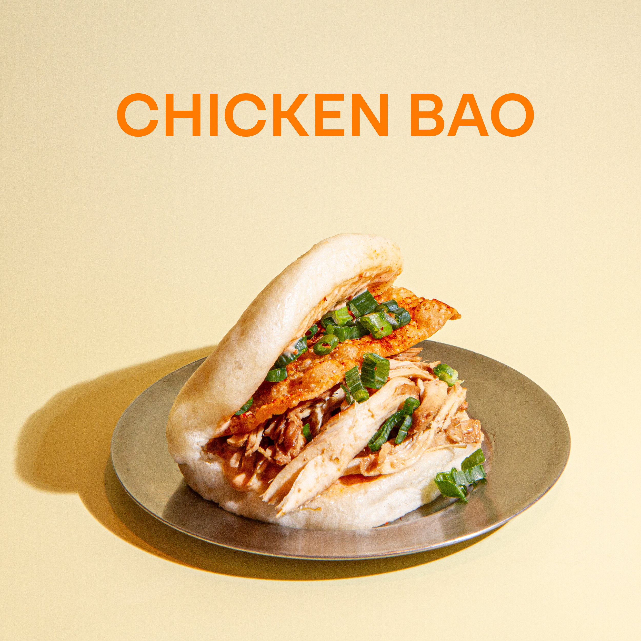 Hand-rolled steamed bun, filled with braised chicken, house mayonnaise and crisps.