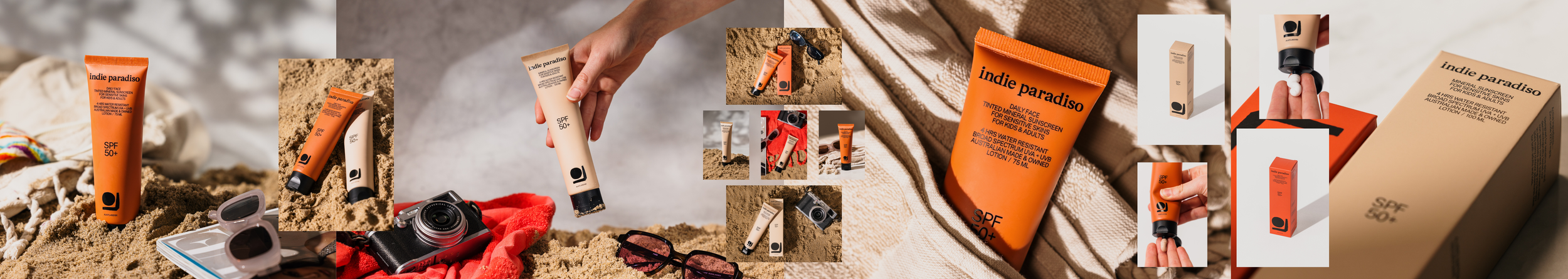 Travel scene on the beach with sunscreen, sunglasses, camera, and beach towel, focusing on sunscreen tube labeled indie paradiso SPF 50+.