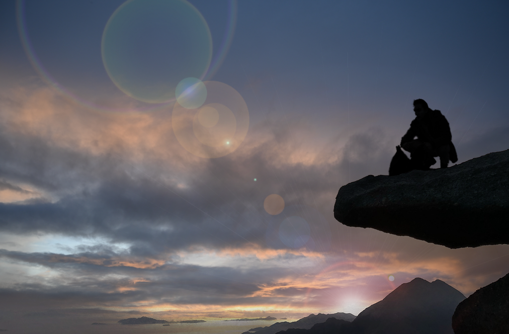 Silhouette of a Man on a ledge