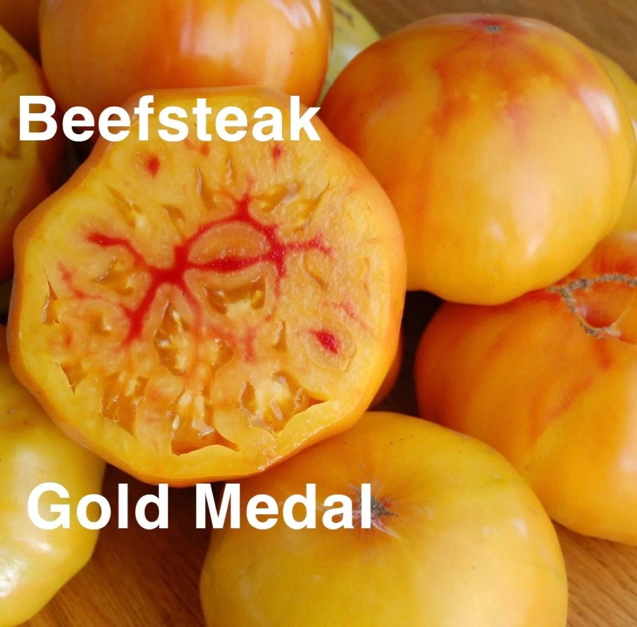 The Gold Medal Heirloom Beefsteak is a show‑stopping slicer known for its stunning bi‑color flesh and exceptionally smooth, sweet flavor. The flavor is rich, mellow, and naturally low‑acid, making it a favorite for sandwiches, caprese, and fresh summ