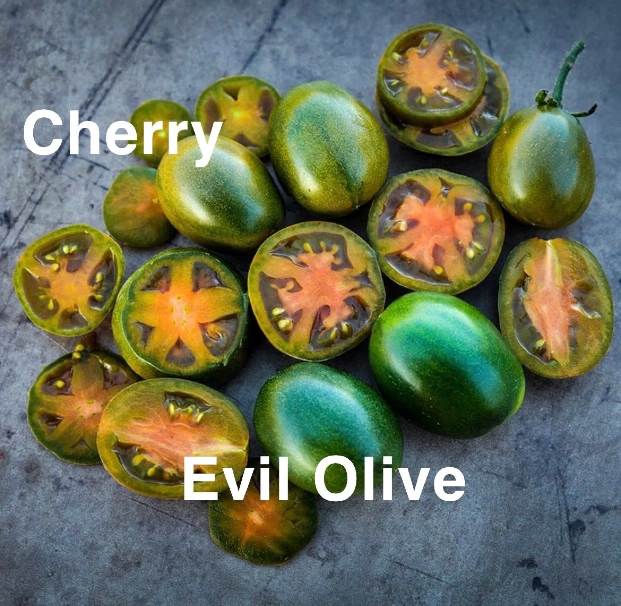 The Evil Olive Heirloom Cherry Tomato is one of the most striking and flavorful cherries you can grow. Their flavor is bold and complex—sweet at first bite with a rich, savory depth that makes them unforgettable. Thin‑skinned, juicy, and intensely ar