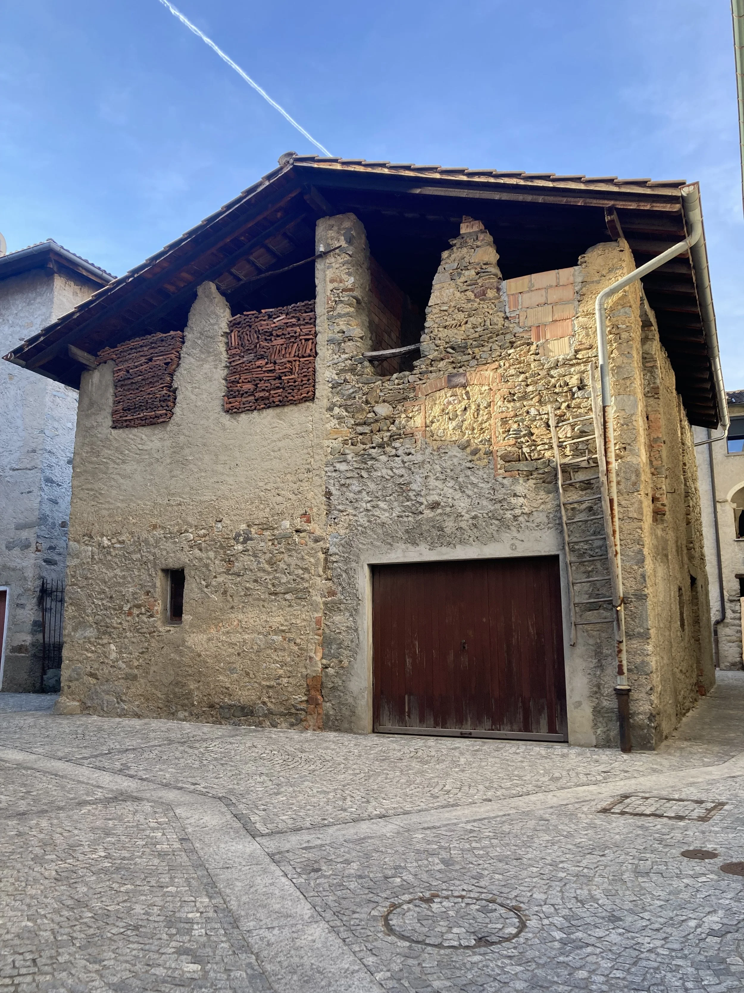 Various images of the old part of Comano