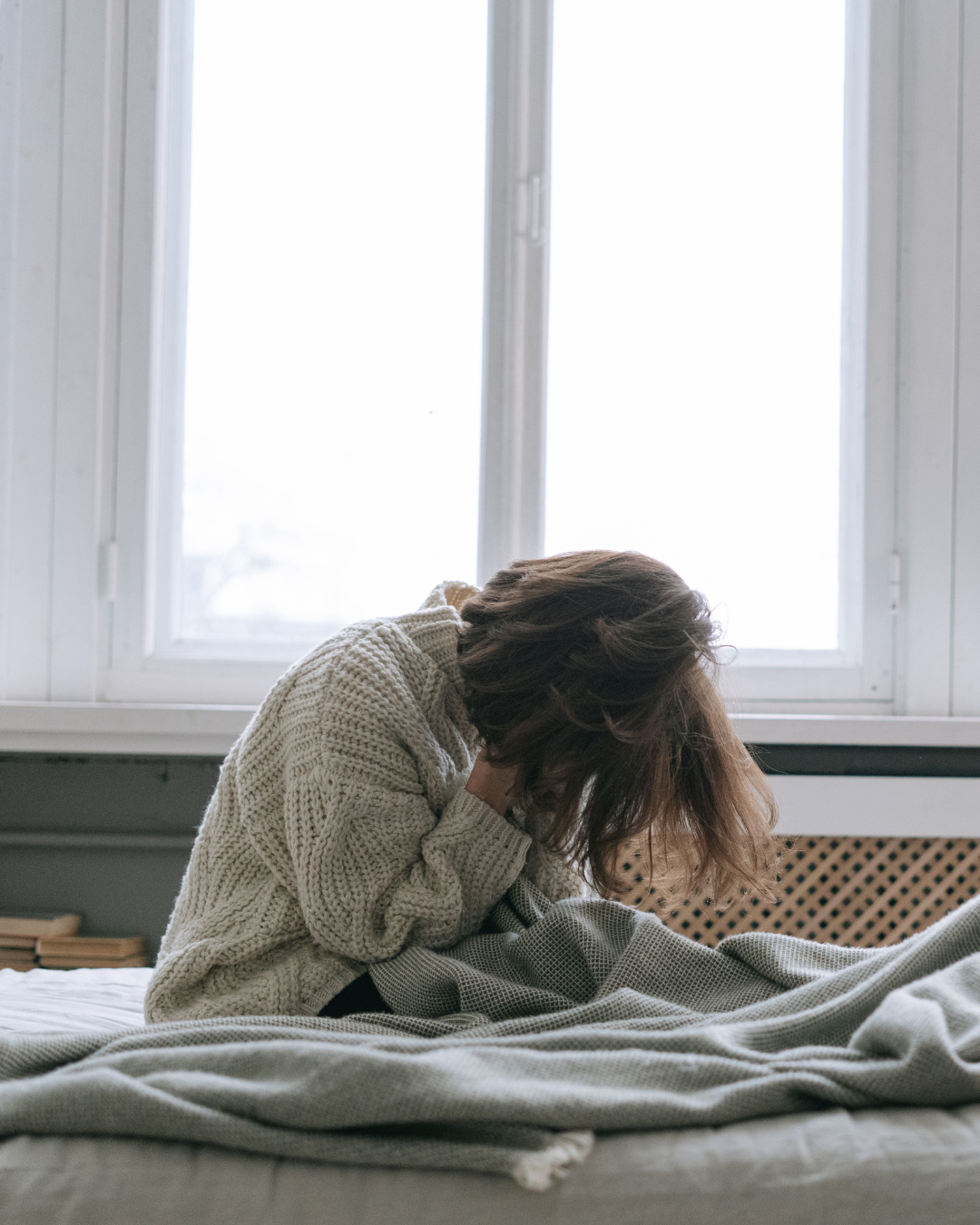 Midlife woman suffers with perimenopause symptoms before treatment at Sapphire Women's Healthcare.