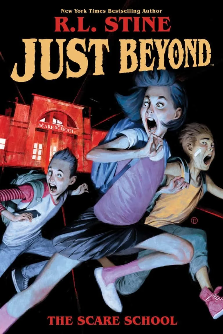 Book cover for 'Just Beyond' by R.L. Stine featuring three children running away from a haunted school labeled 'The Scare School'. The main girl has blue hair and a frightened expression, with the other two children also appearing scared.